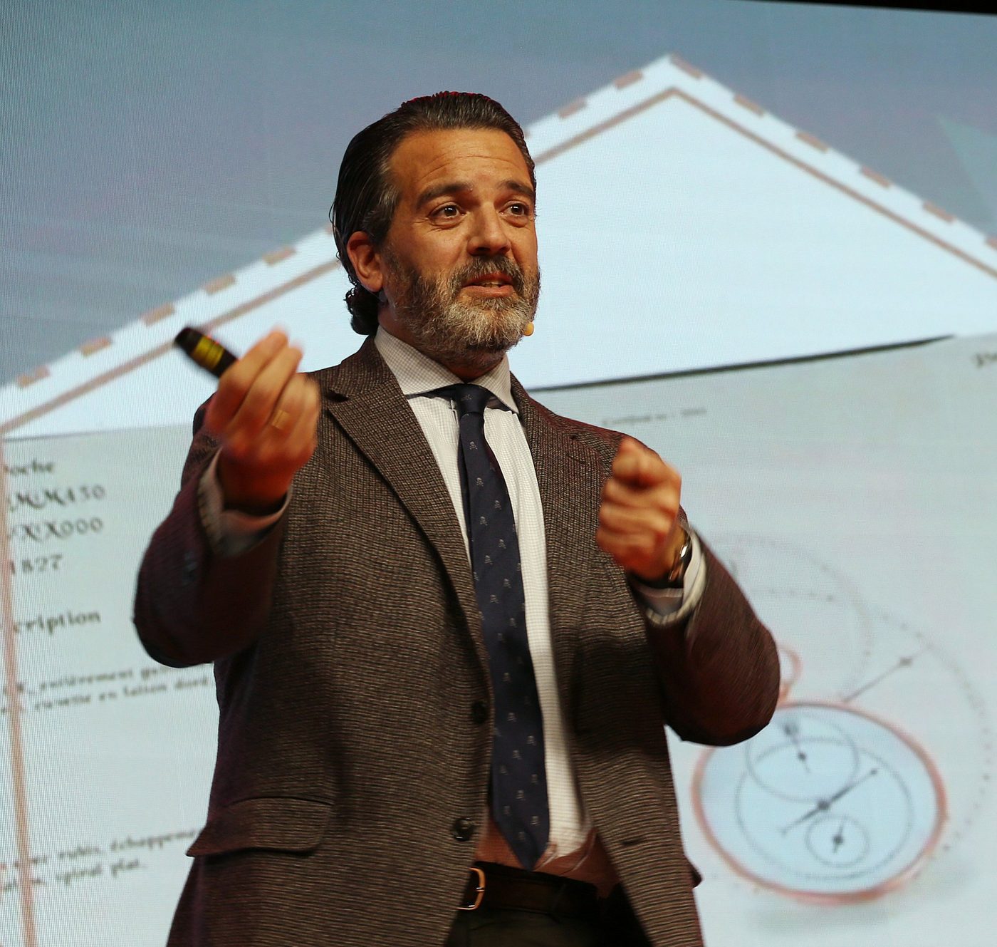 Pedro Lopez-Belmonte delivering a keynote on stage